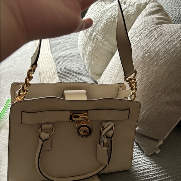 Gently used Michael Kors handbag, has handles and a strap with gold accents - Picture 3 of 3